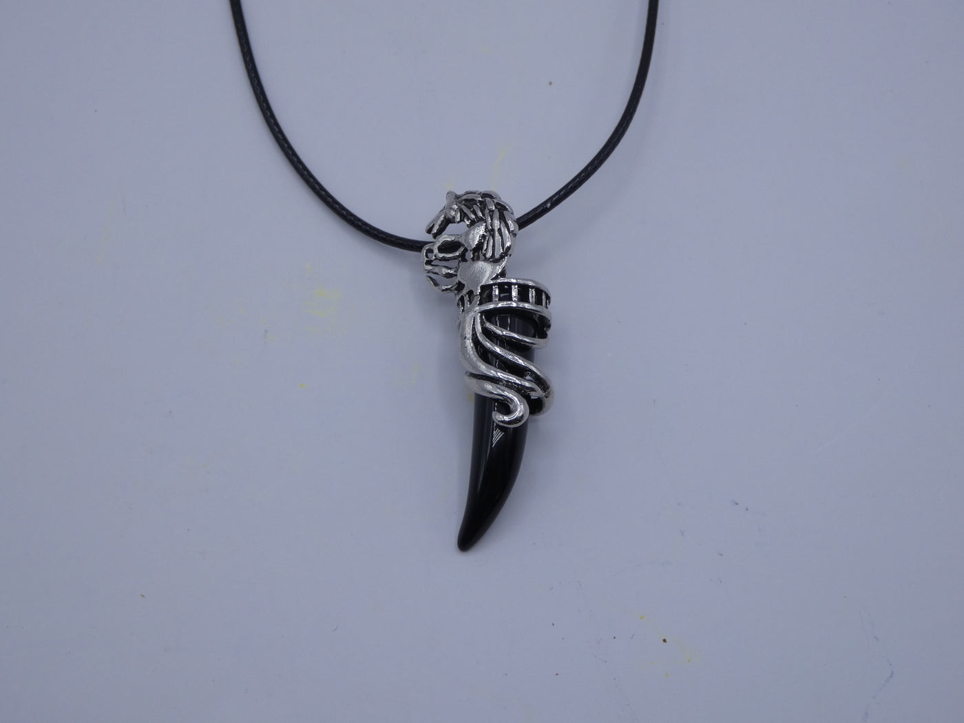 Silver Lion Obsidian Tooth